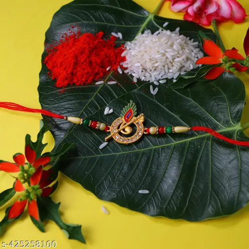 Effete Krishna Flute Rakhi Set Of 1 & Chocolate Choco Almond 32Gm With Pooja Coin, Roli Chawal & Greeting Card