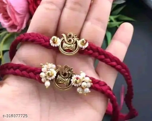 Fency colour full coupal Rakhi. ( Pack of 2 Pics. )