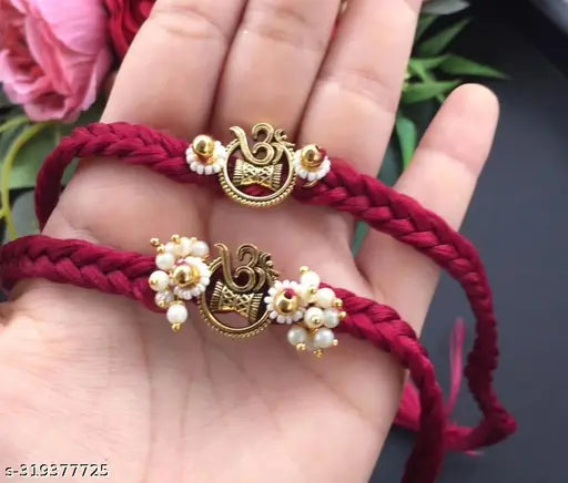Fency colour full coupal Rakhi. ( Pack of 2 Pics. )